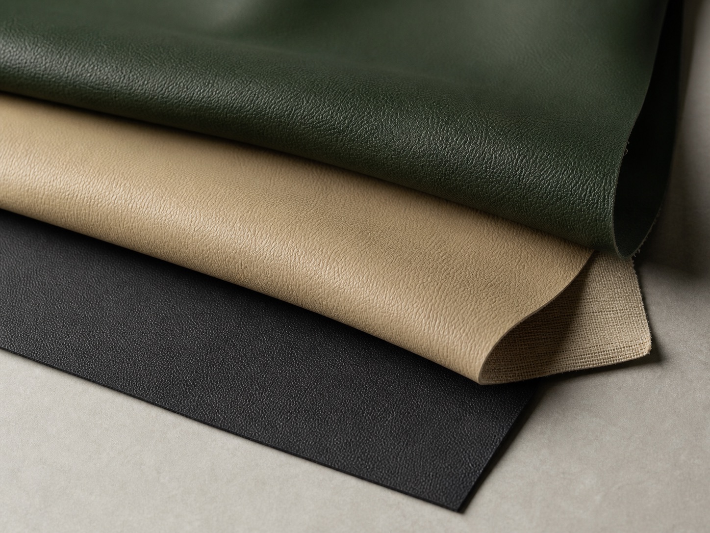 Layered green, beige and charcoal synthetic leather